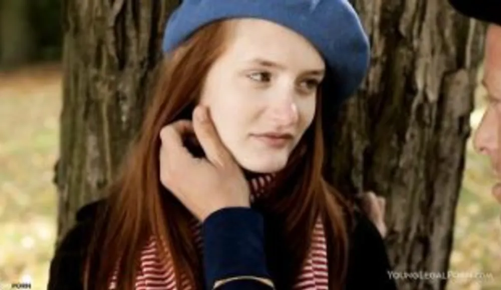 Slim red Frenchwoman has sex on the lawn